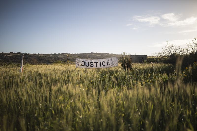 On March 10, 2018, people erected a sign at the site where Daphne was killed to commemorate her. (Photo by Dan Kitwood/Getty Images)